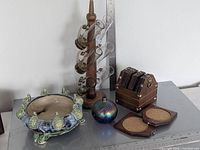 All items grouped: shot-glass tree with six glasses, turtle bowl, iridescent vase, coaster holder with two coasters displayed
