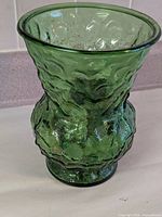 Green pressed-glass vase front view