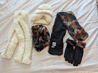 Full layout of white faux fur scarf and hat, multicolor faux fur hat, Passigatti scarf, black gloves