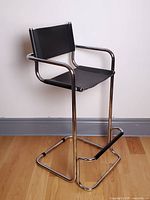 Full view of chrome cantilever bar chair