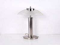 Full view of stainless steel table lamp, shade and base