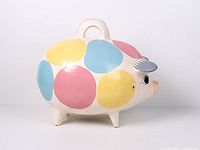 Left side view showing polka dot pattern and carry handle