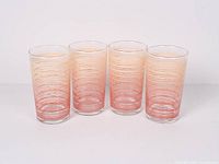 Full set of four highball glasses front view