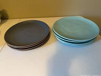 Two stacks of dinner plates, total eight