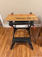 Overall view of Workmate 350 folded open on floor