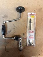 Hand brace and packaged bit together