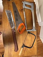 All four saws laid out on table