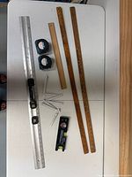 All measuring and levelling tools laid out on table