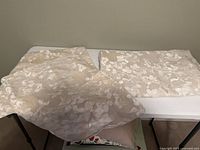 Duvet cover and two pillow shams laid out showing pattern and color