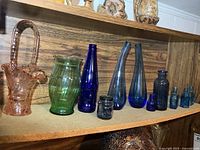 Full shelf view showing all glass pieces