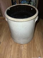 Full view of large stoneware crock interior and exterior