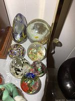 Group view of all paperweights on table