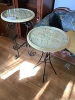 Two side tables showing full view of bases and tops