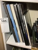 Spines of six Canada Post Collection Canada yearbooks on shelf