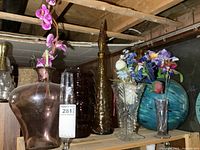 Shelf view showing all six glass pieces