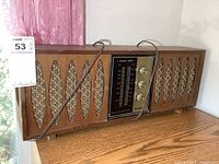 Front view of Supersonic AM/FM radio showing speaker grilles and control panel