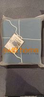 Front view of sealed Swift Home Blue Dusk duvet cover set package