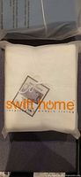 Front view of sealed Swift Home duvet cover set packaging