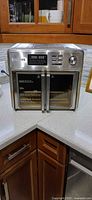 Front view of closed Kalorik MAXX oven on countertop