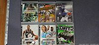 Front view of six PS3 game cases