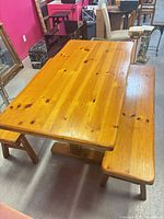 Dining table with benches tucked underneath