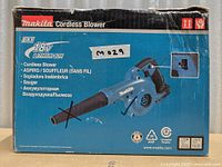 Front of Makita blower retail box showing full product image and missing nozzle marked