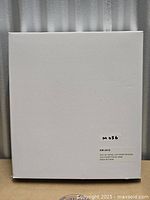 Front of sealed white box containing the Mercer 41 electric menorah, label visible