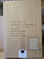 Sealed shipping carton for Amazon Basics soft dog crate