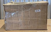 Sealed but dented cardboard box containing East Urban Home 7-light pendant