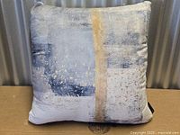 Front view of the Leisel abstract throw pillow showing entire design and condition