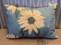 Front view of sunflower print rectangle pillow