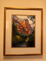 Full view of framed watercolor on wall