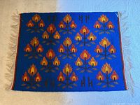 Full view of kilim showing size, colors, motifs, fringe