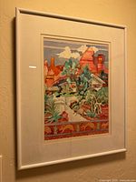 Full view of framed watercolor on wall, shows complete artwork, mat and frame