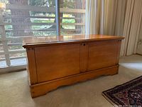 Full view of front and top of cedar chest