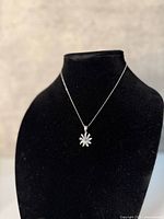 Front view of necklace on display bust