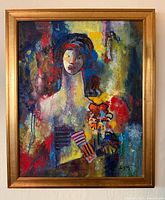 Front view of the framed abstract portrait painting