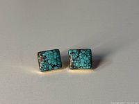 Front view of turquoise stud earrings