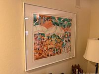 Framed watercolor painting on wall