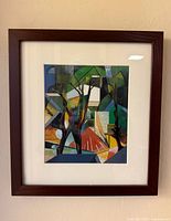 Front view of framed Auguste Herbin “Three Trees” print showing artwork, mat and wood frame