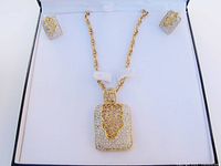 Necklace and earrings set displayed in box