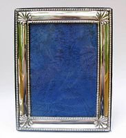 Front view of sterling silver frame with blue insert