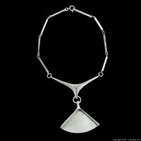 Full view of necklace showing chain, centrepiece and pendant