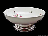 Side view showing exterior rose pattern and sterling silver foot