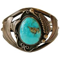 Front view showing turquoise cabochon and silverwork