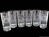 Front view of six etched Cornflower tumblers