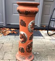 Full view of terracotta pedestal stand