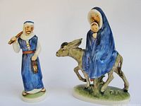 Both Goebel Flight Into Egypt figurines side by side