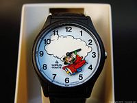 Front view of watch showing Mickey Mouse airplane design, dial details