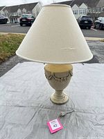 Full view of lamp with shade showing overall form and color